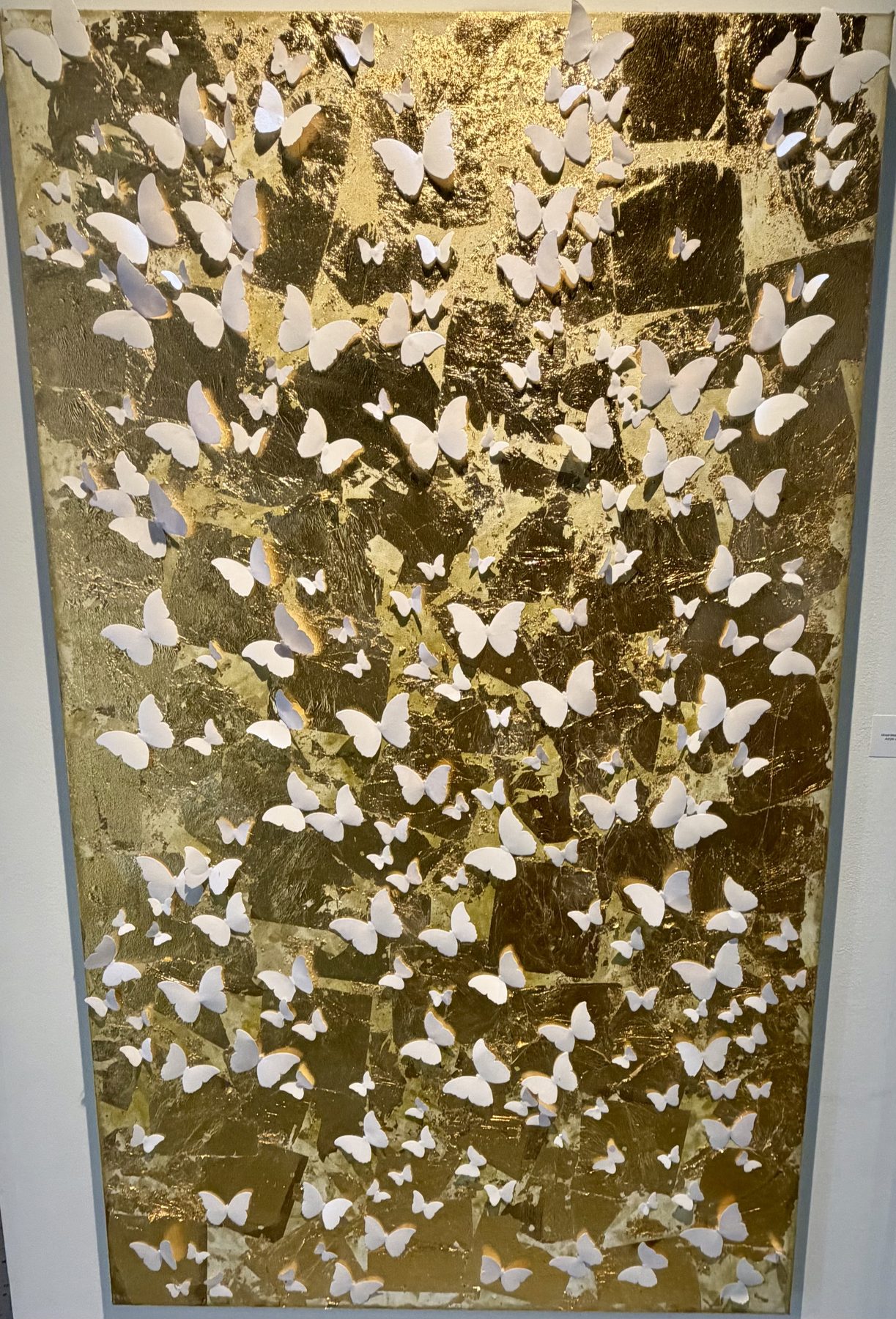 Gold-and-white butterfly art installation